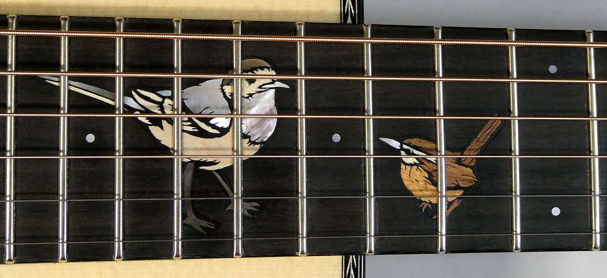 Wagtail and wren inlay close up